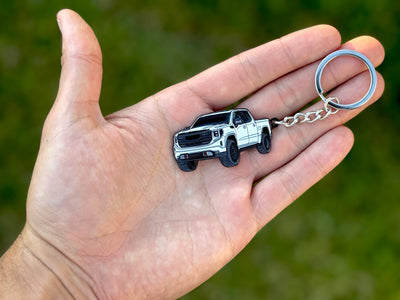 white gmc sierra toy truck
